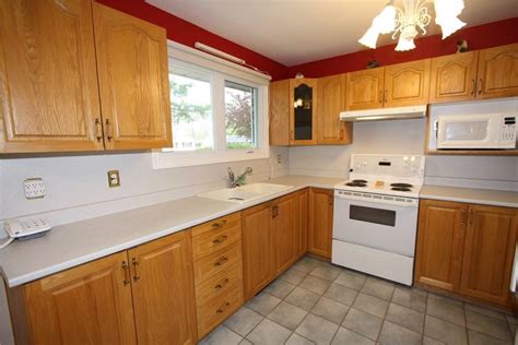 golden oak honey oak cabinets with stainless steel appliances|honey oak cabinets white.